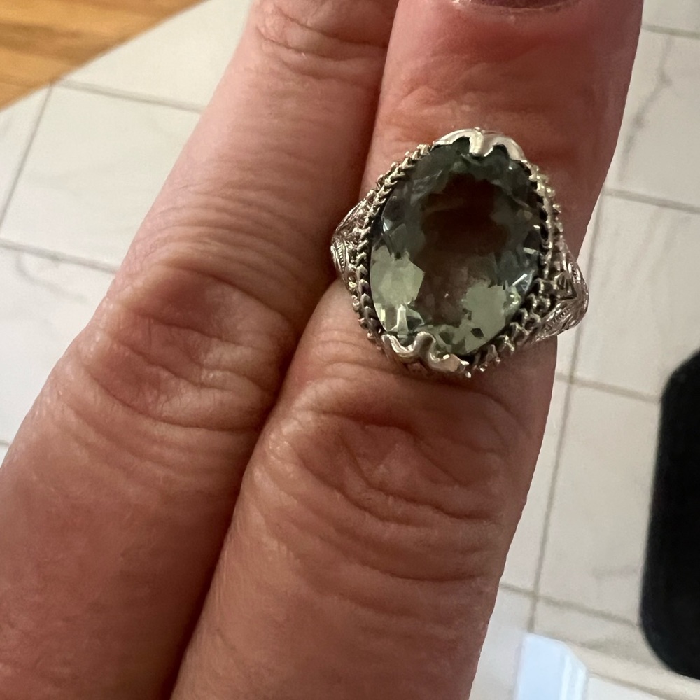 Sterling silver ring with its pale blue/green clear stone